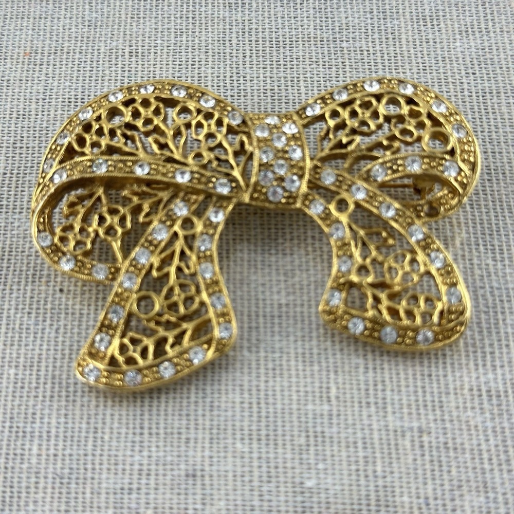 Signed 1928 Gold Tone Rhinestone Bow Brooch vintage filagree ribbon pin